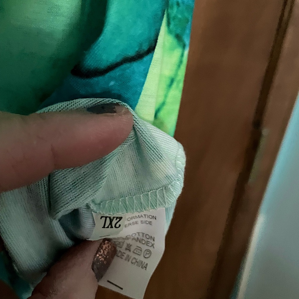 Four leaf clover rye dyed blouse.  2 xl. But more like a x large.  Best offer